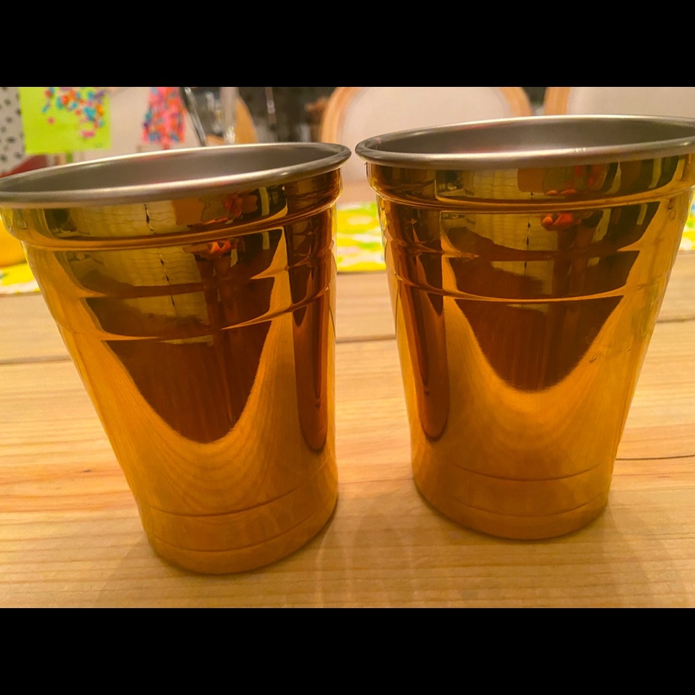 2 gold metal “Solo” cups